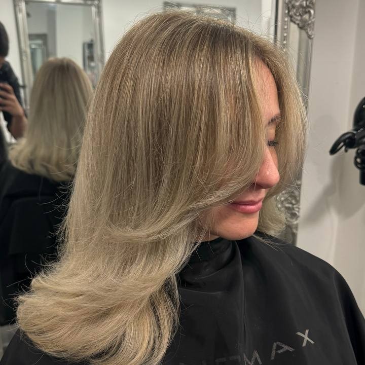 Side profile of blonde highlights with soft contouring and natural blending in Ryde