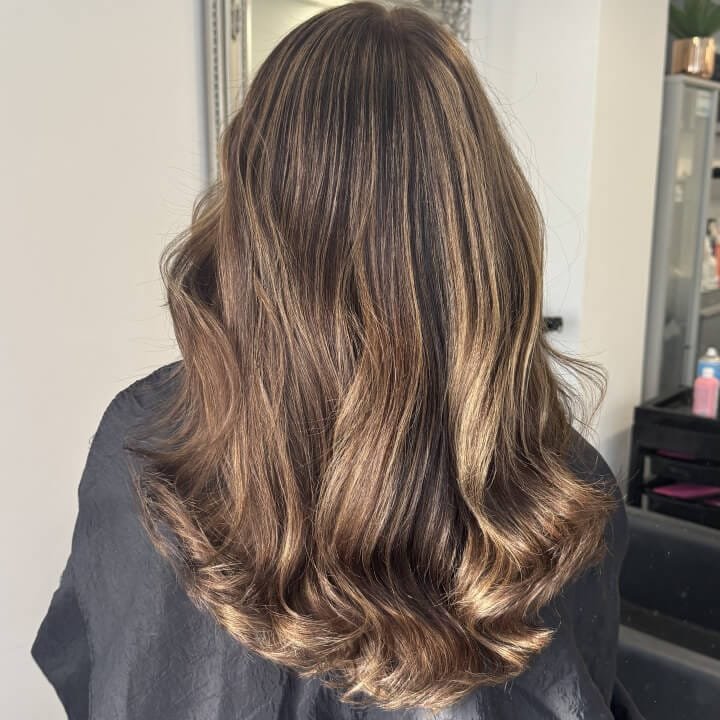Long wavy haircut by Alina Kalinichenko | Hair stylist Ryde Isle of Wight