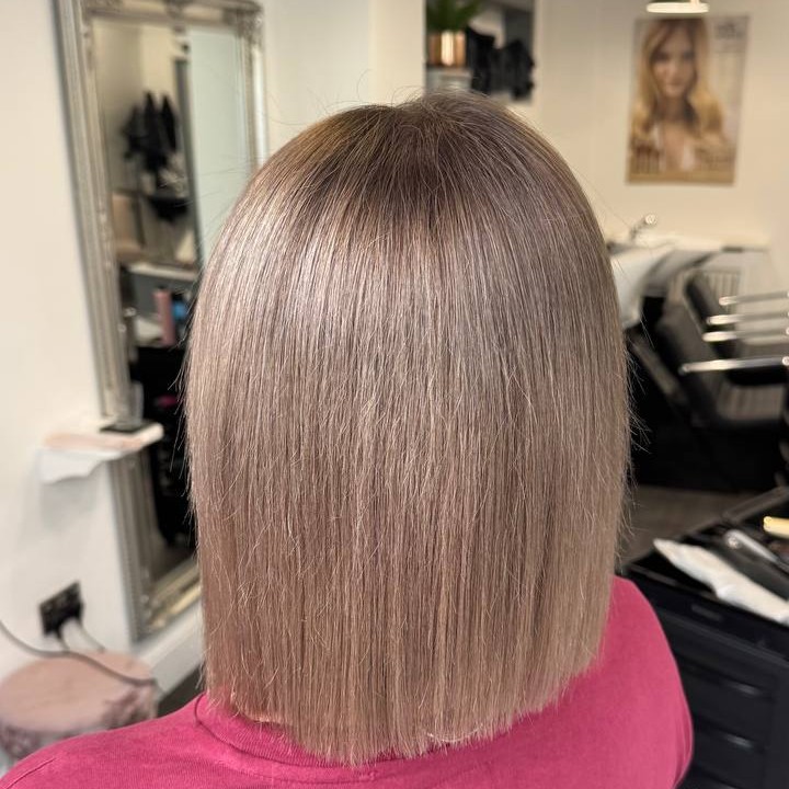 Soft layered blonde haircut by Alina Kalinichenko | Hair stylist in Ryde, Isle of Wight