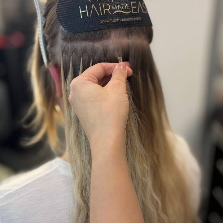 Applying individual hair extensions at the back section of the head – Alina Kalinichenko | Ryde IOW Hair Stylist